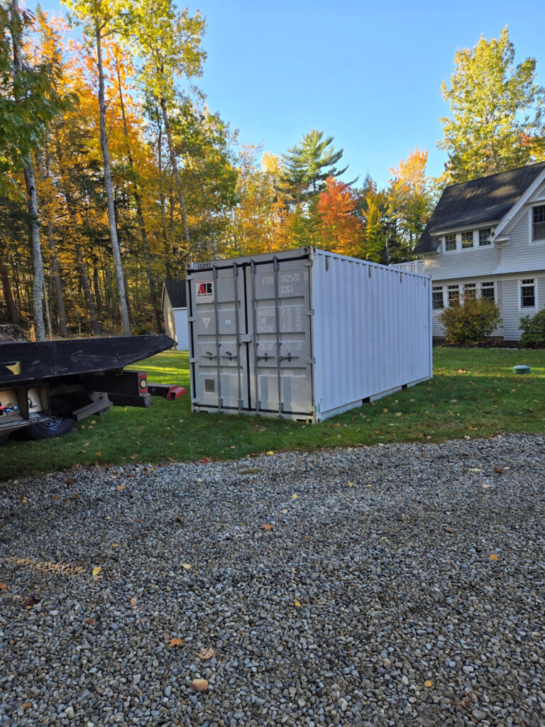 Abco Rental & Storage, Inc delivery truck transporting 20ft storage containers to Frye Island Maine for Greatfalls Construction
