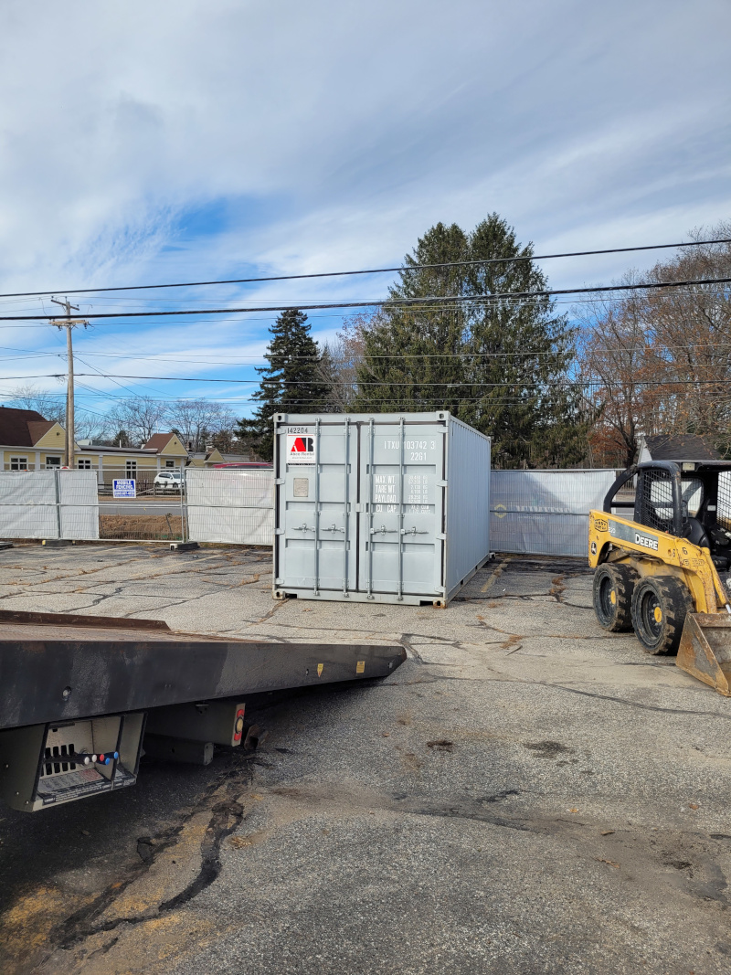 20' storage container rental was delivered to a new car dealership for window storage at Brunswick, ME.
