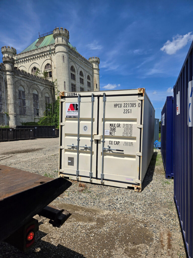 Abco Rental and Storage 20-foot shipping container being loaded at Portsmouth Naval Shipyard