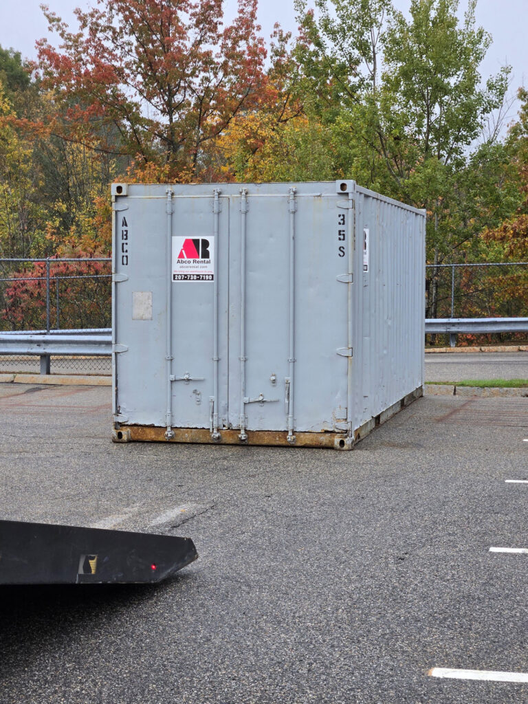 20ft storage container delivered to a Biddeford ME grocery store for winter road salt storage by Abco Rental & Storage, Inc
