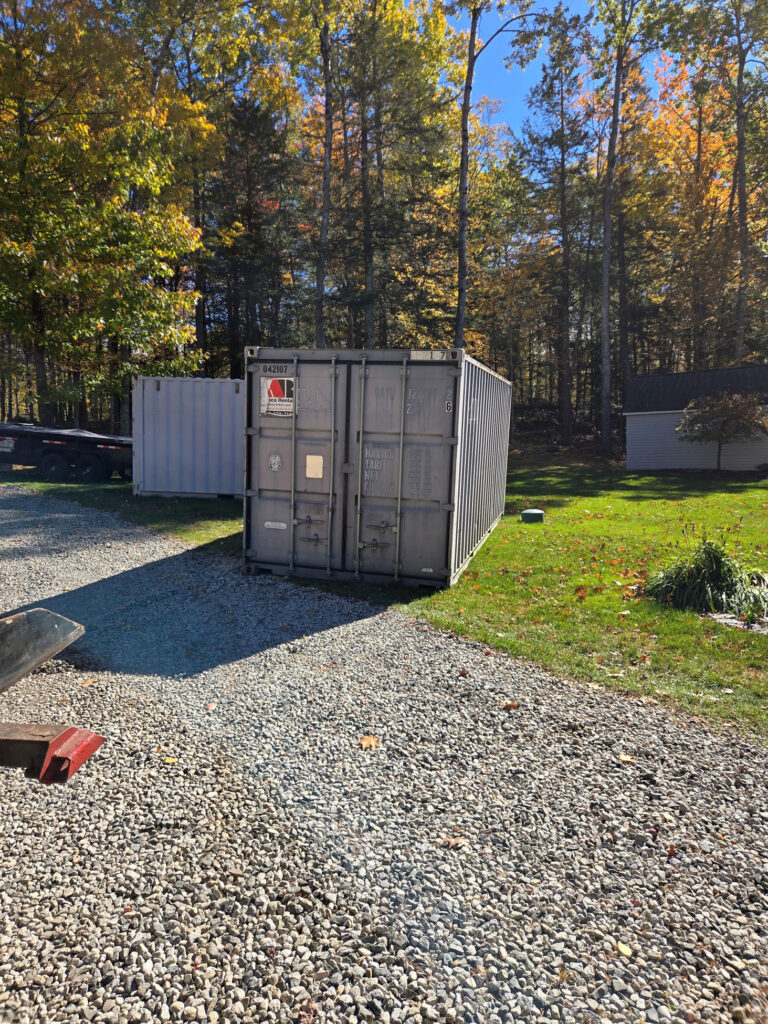 Abco Rental & Storage, Inc delivery truck transporting 20ft storage containers to Frye Island Maine for Greatfalls Construction
