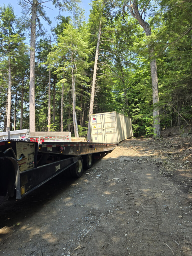 40-foot storage container rental used to secure equipment and supplies for a new home build in Gardiner, ME 04345