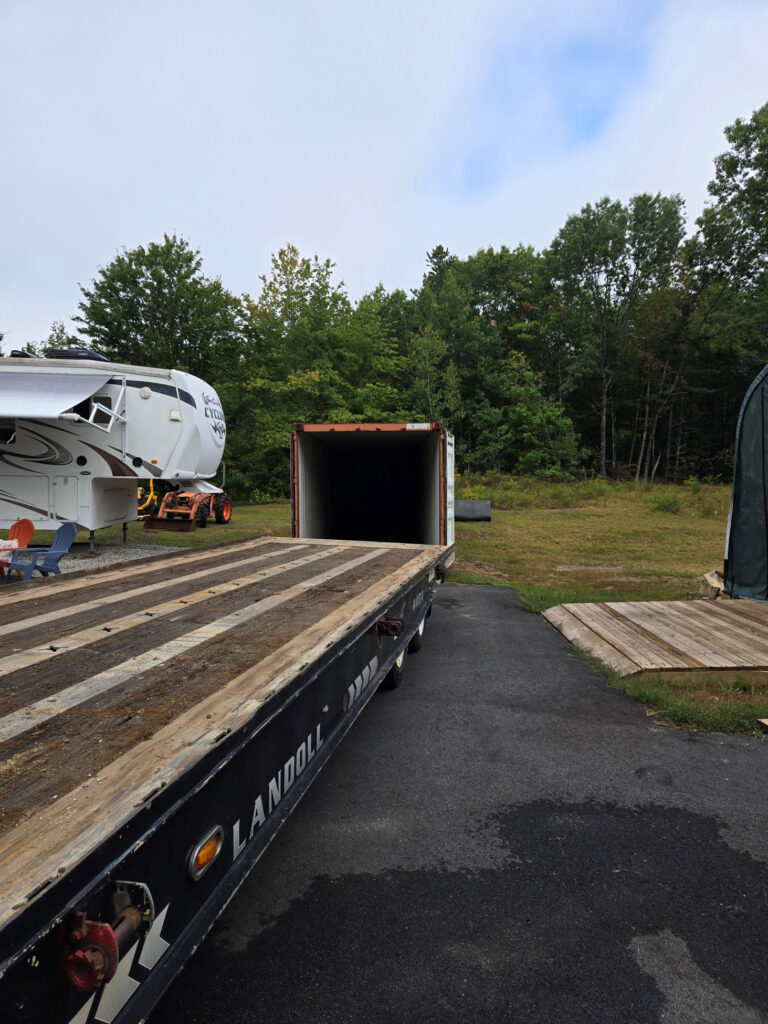 40ft storage container delivered to Hollis Center for a garage clean-out