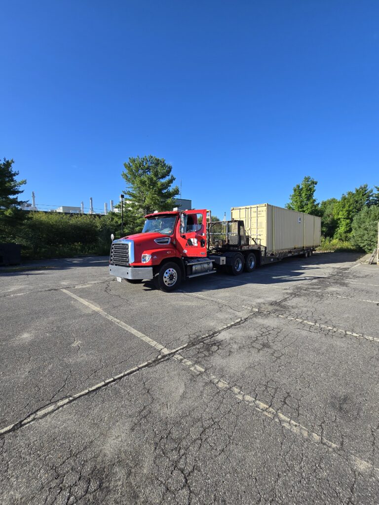 45ft storage containers being shuttled in TURNER, ME