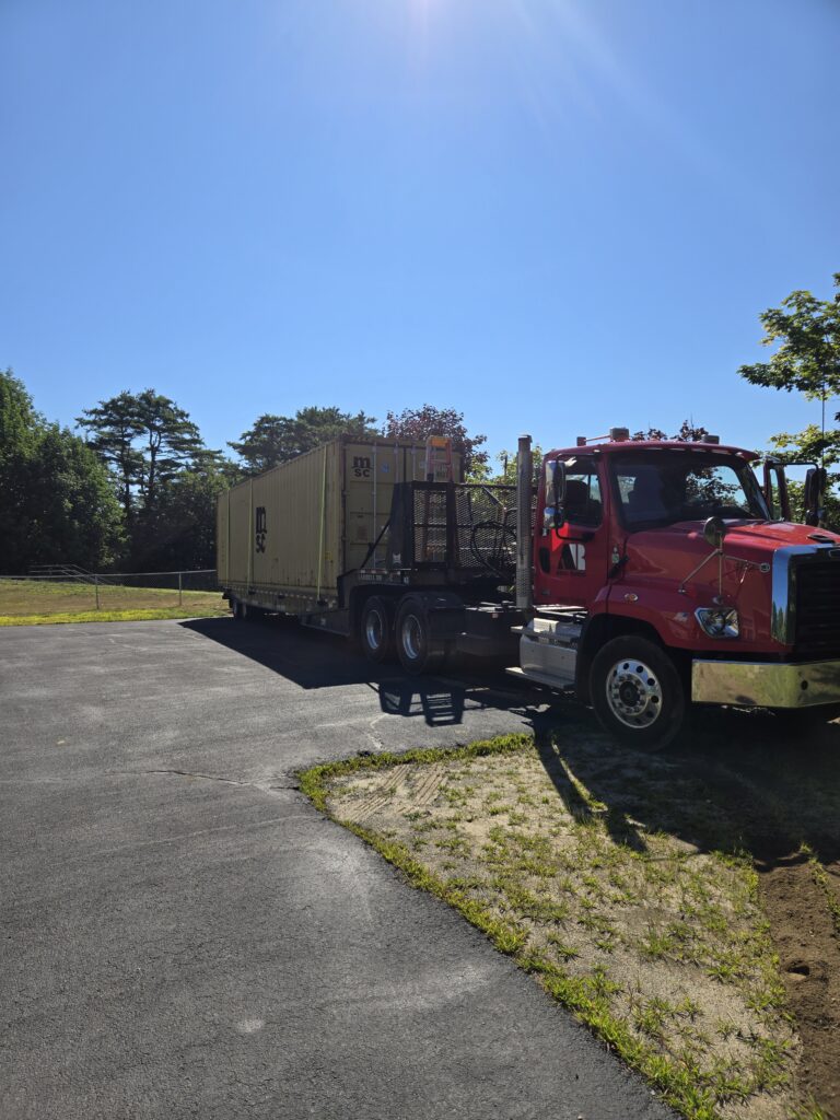 45ft storage containers being shuttled in TURNER, ME