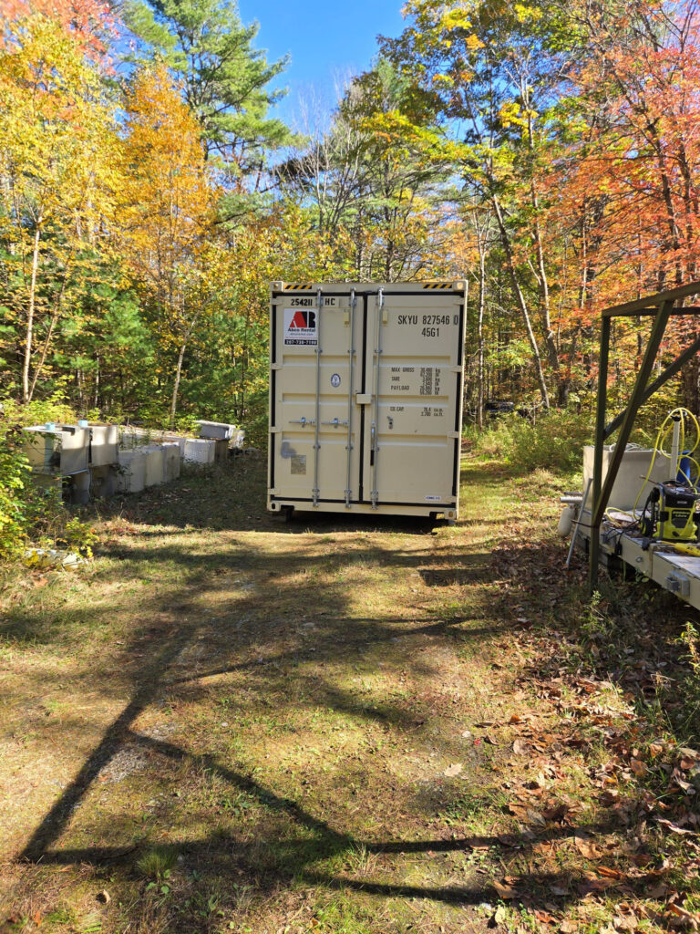 Abco 40ft storage container delivered doors facing cab for new home construction site in Freeport Maine
