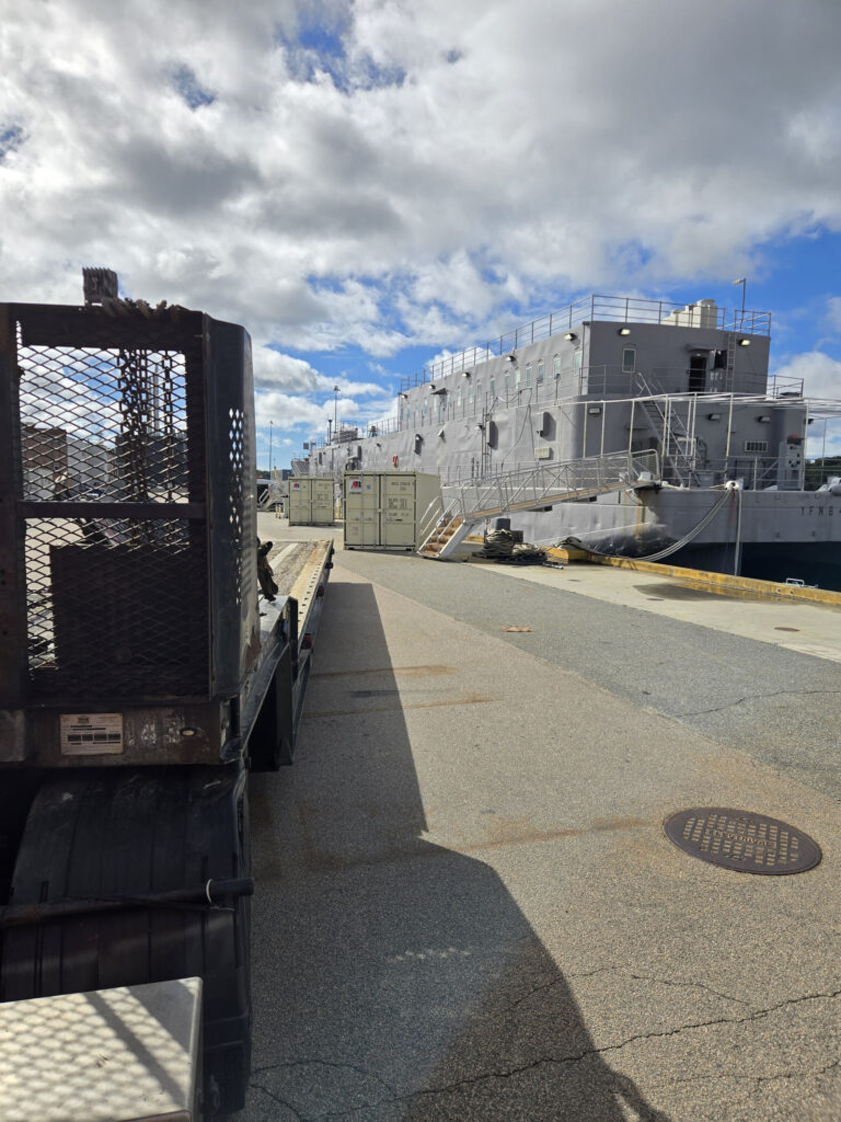 Two Abco Rental and Storage 20ft shipping containers staged for transport between Portsmouth Naval Shipyard and Groton Connecticut